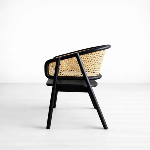 INTERIORZE Nero teakwood cane lounge arm chair with natural cane wrap back and matte black finish