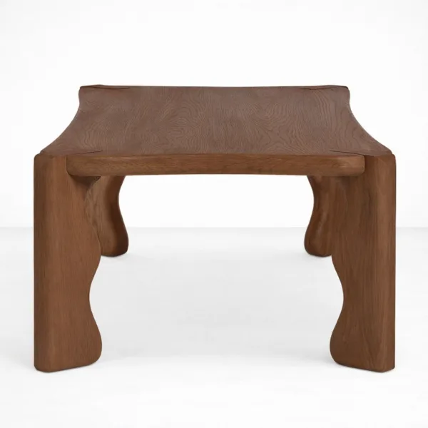 INTERIORZE Wavren sculpted teakwood centre table with artistic carved legs