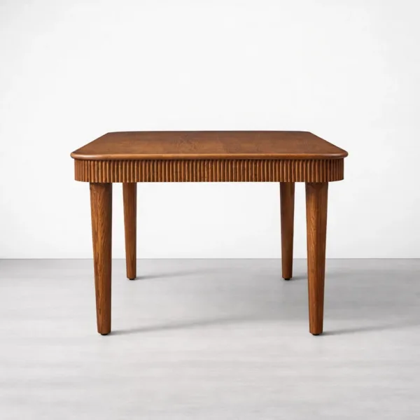 Side view of INTERIORZE Elvora solid teakwood extendable dining table