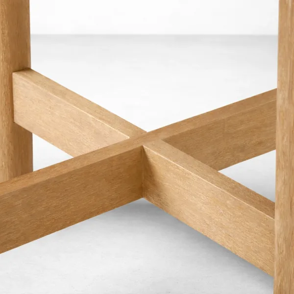 Close-up of cross-braced base support on INTERIORZE Orvyn round dining table