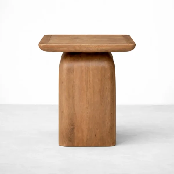 Monolith Curve teak wood side table by INTERIORZE with square top and rounded pedestal base