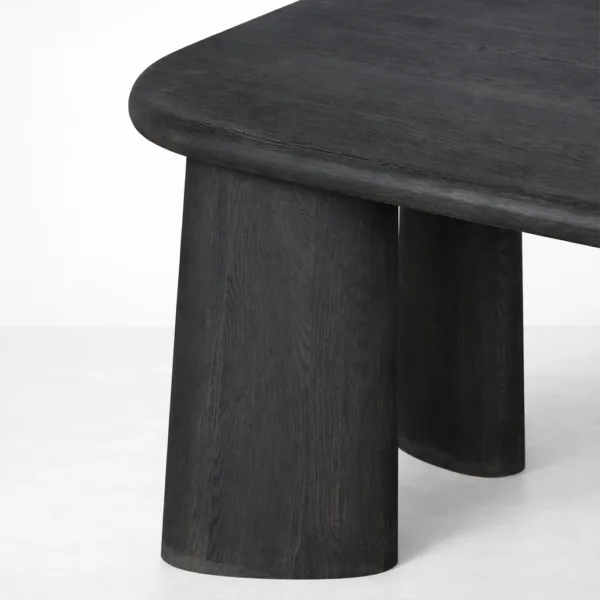 Front view of INTERIORZE Noir Arc black solid wood dining table