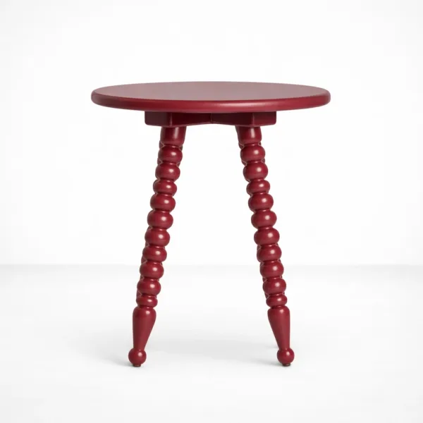 Handcrafted round teakwood side table with turned legs in ruby red finish by INTERIORZE
