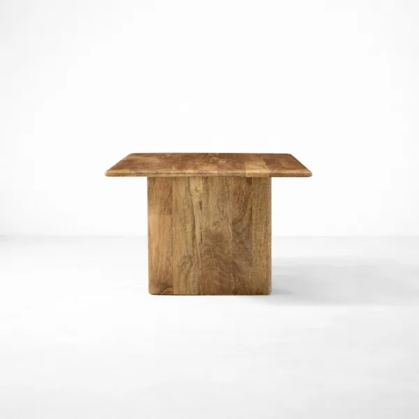 INTERIORZE teakwood dining table with rectangular top and panel legs in natural finish