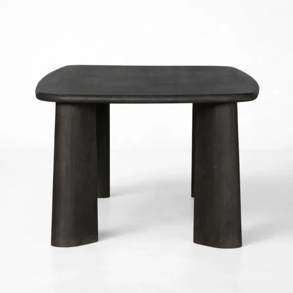 Side view of INTERIORZE Noir Arc black solid wood dining table