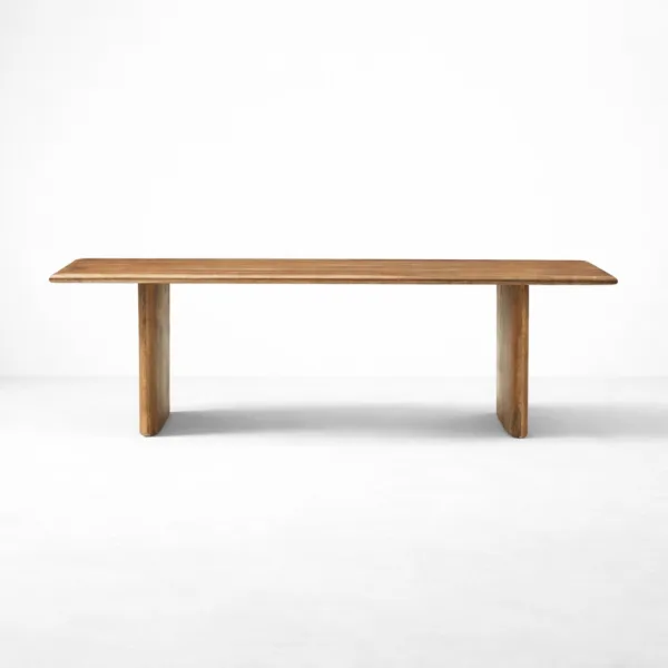 INTERIORZE teakwood dining table with rectangular top and panel legs in natural finish