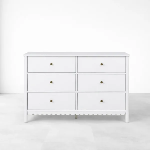 front view of white teak wood chest of drawers with scalloped base by INTERIORZE
