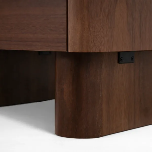 close up detail of base and leg section on teakwood bedside table