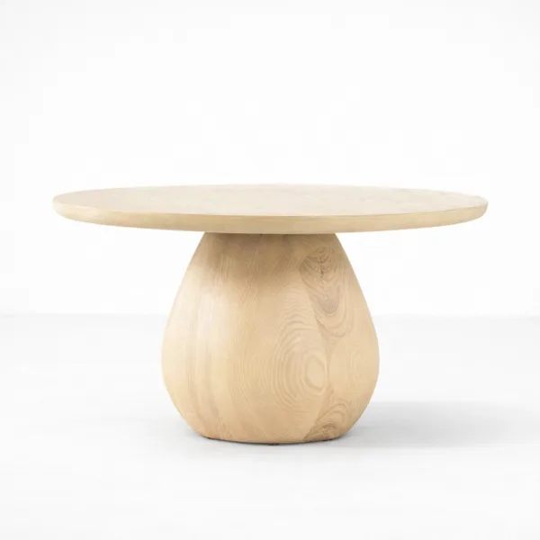 INTERIORZE ash wood coffee table with round top and sculptural pedestal base in natural finish