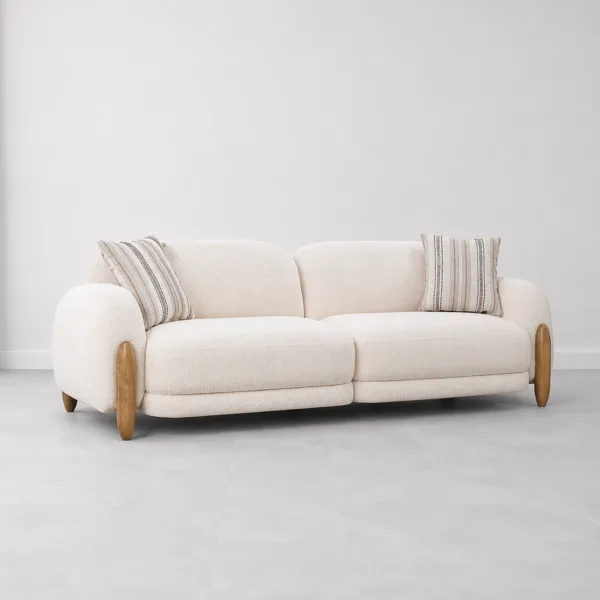 INTERIORZE cream boucle sofa with rounded arms and wooden side accents