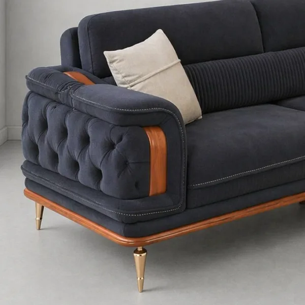 INTERIORZE navy blue sofa with tufted arms and wooden base
