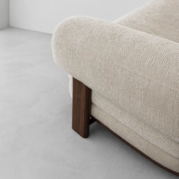 INTERIORZE cream boucle sofa with rounded arms and dark wood legs