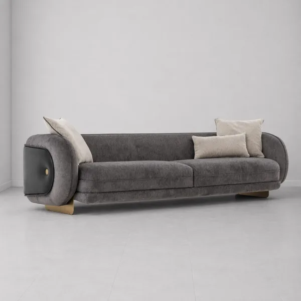 INTERIORZE charcoal designer sofa with black side panels and gold-toned base