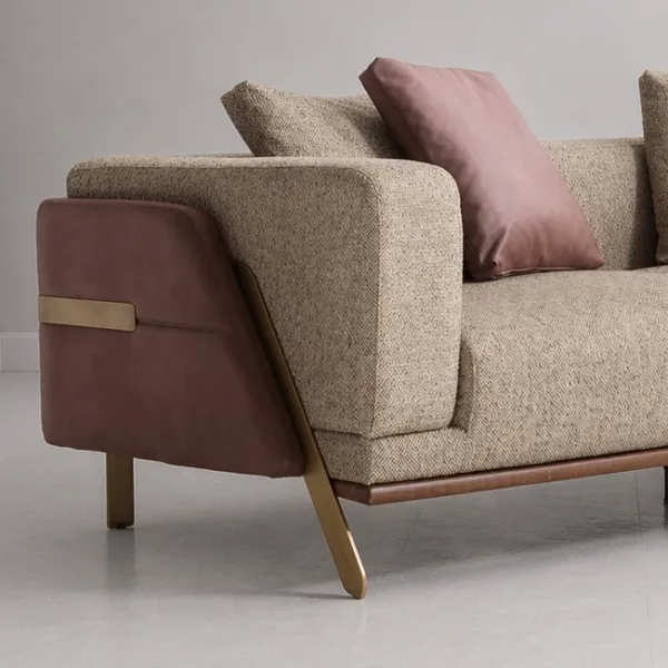 INTERIORZE beige fabric sofa with brown side panels and brass legs