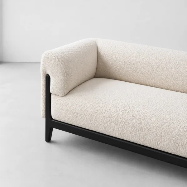 INTERIORZE ivory boucle sofa with rounded arms and black frame