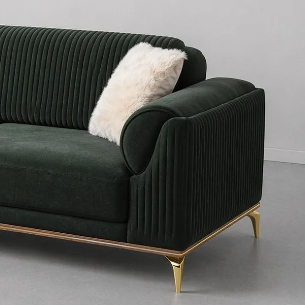 INTERIORZE dark green velvet sofa with ribbed back and gold legs