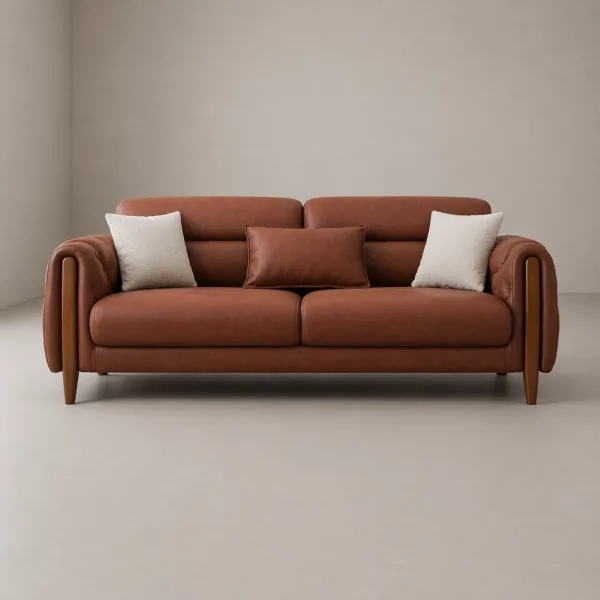INTERIORZE tan leather sofa with tufted arms and wooden side accents