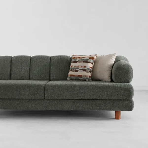 INTERIORZE dark green boucle sofa with rounded arms and wooden legs