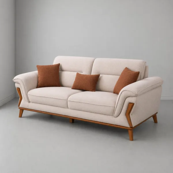 INTERIORZE cream fabric sofa with wooden accents and rust pillows