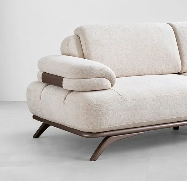 INTERIORZE cream boucle sofa with pillow armrests and brown metal legs
