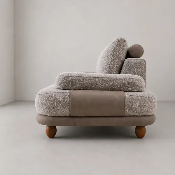 INTERIORZE greige boucle sofa with rounded arm pads and layered base detail