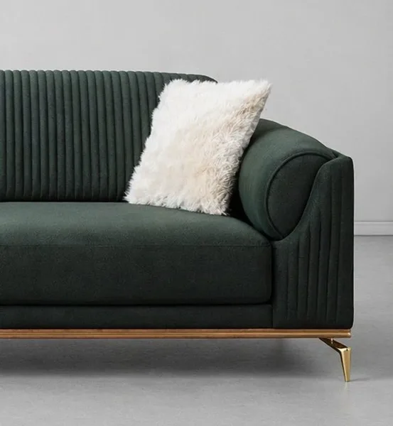 INTERIORZE dark green velvet sofa with ribbed back and gold legs