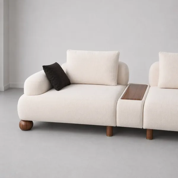 INTERIORZE cream modular sofa with wooden center tray and rounded wood legs